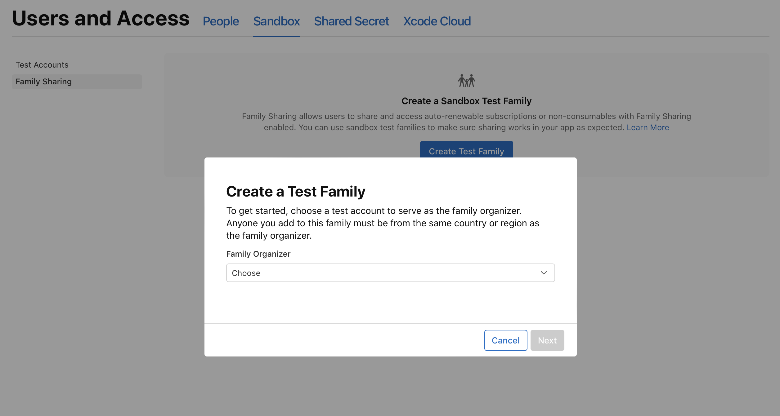 截屏为“家人共享”页面，显示“创建测试家庭”对话框，其中包含“家庭组织者”菜单。