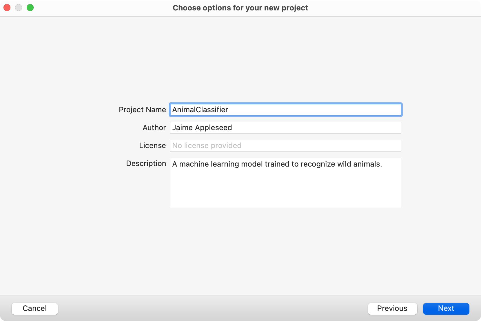 「Project Name」、「Author」、「License」、「Description」といったテキストフィールドが表示された新規プロジェクトのオプションウィンドウのスクリーンショット。最初のテキストフィールドにはそれぞれ、値として「Animal Classifier」、「Jamie Appleseed」、「No license provided」が示されています。説明のテキストフィールドには「A machine learning model trained to recognize wild animals」と表示されています。
