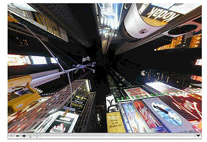 A QuickTime VR panorama movie with a view upward into the  night sky at Times Square