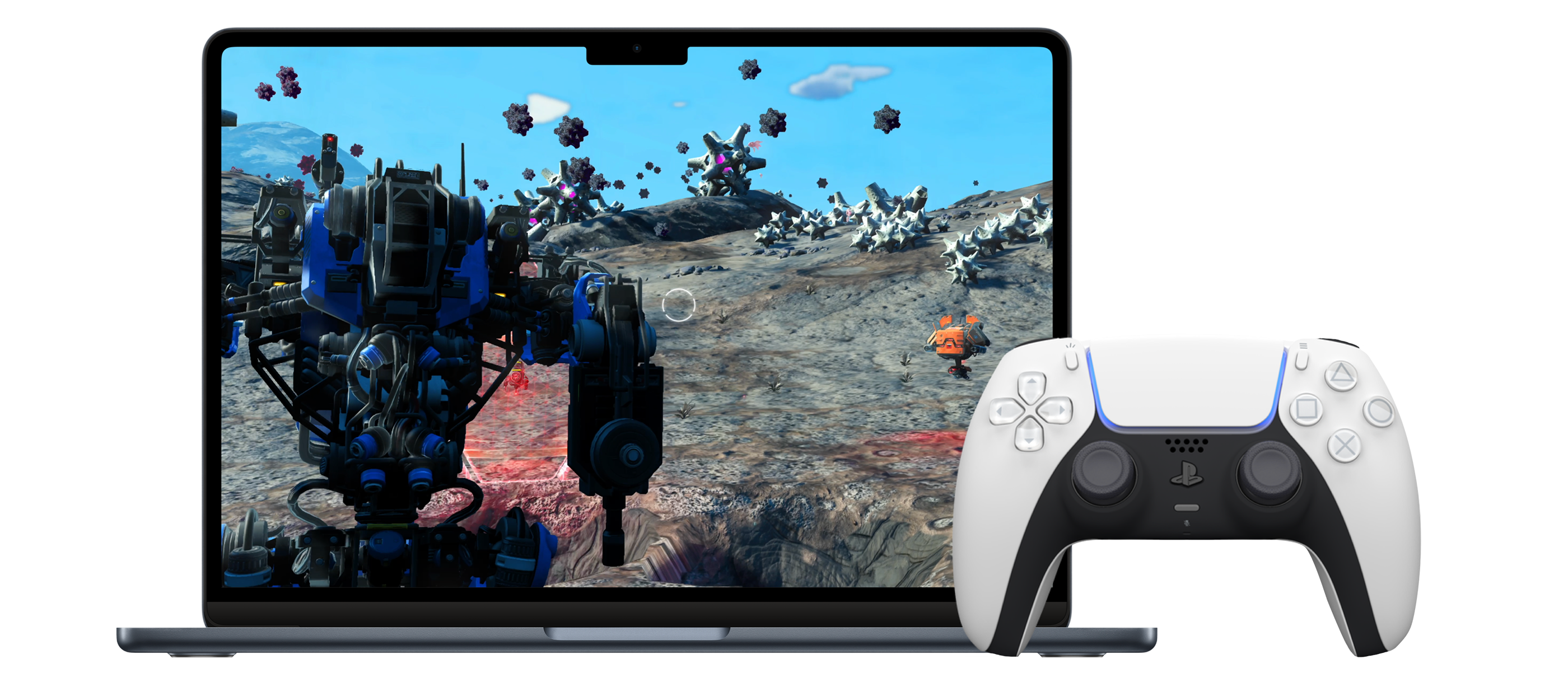 A MacBook Pro with a robot video game open. Next to a gaming controller.