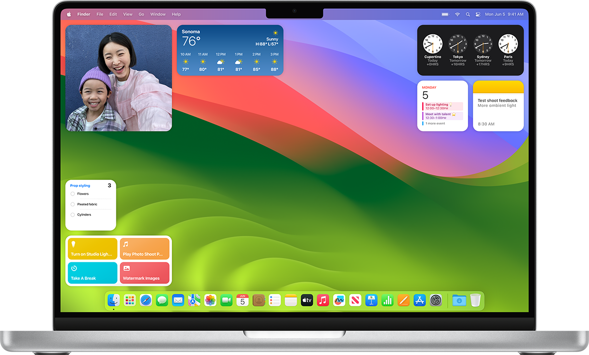 一张 MacBook Pro 图片，其中显示了桌面以及多个打开的小组件。